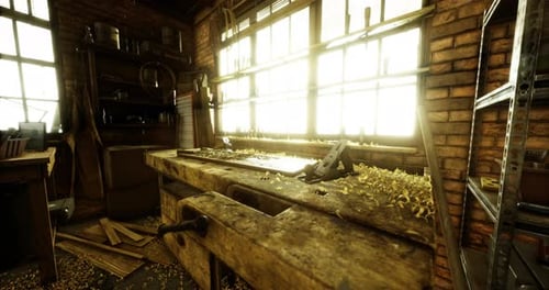 Workshop Filled with Sunlight Highlighting Tools and Wood Shavings
