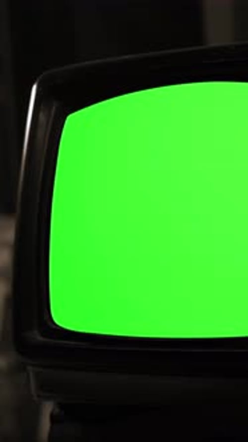 Vintage TV Powers On With Green Screen and Static, Dolly Shot, 4K Vertical