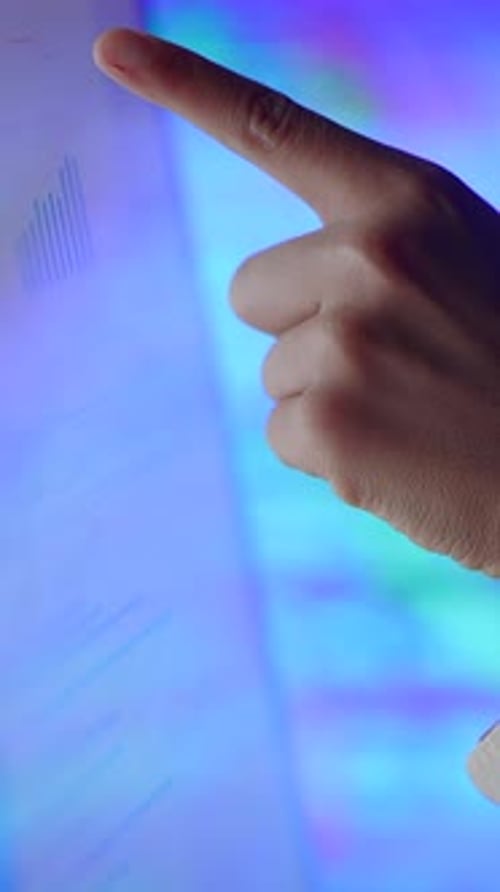 Hand Interacts with Futuristic Touchscreen Display