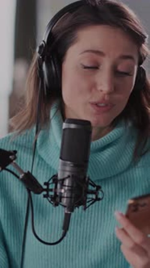 Young Woman Recording Podcast in Studio Close Up
