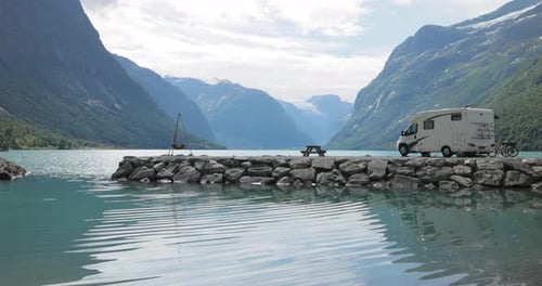 Family vacation travel RV, holiday trip in motorhome. Beautiful Nature Norway natural landscape.