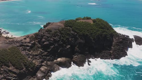 Aerial View of a Tropical Beach with Turquoise Water and Boats