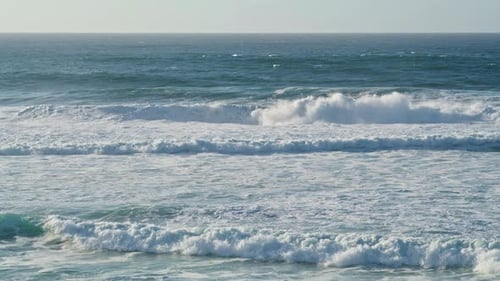 White Waves Rolling Sunny Coastline in . Storming Ocean Water Foaming