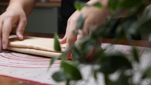 Pastry Chef Pastry Chef Hand Kneading Raw Dough Over Kitchen Table