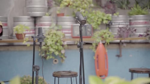 Condenser mics lined on a outdoor stage