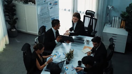 Top view of smart manager looking at financial statistic on tablet. Directorate.