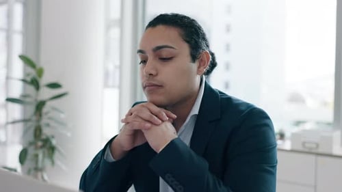 Serious Young Adult Thinking in Office