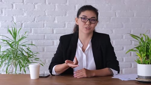 Portrait of Remote Business Coach Woman Smiling While Looking at Camera Webcam Point of View at Home