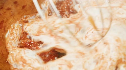 Close Up of Boiling Sugar with Bubbles Turns Into Caramel Caramelization Making Berry Jam at Home