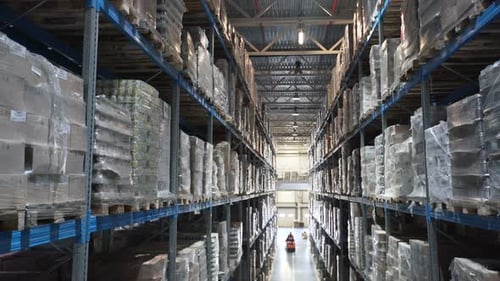 Big Factory Warehouse. Store Aisles. Camera Travels Inside a Large Store. Warehouse