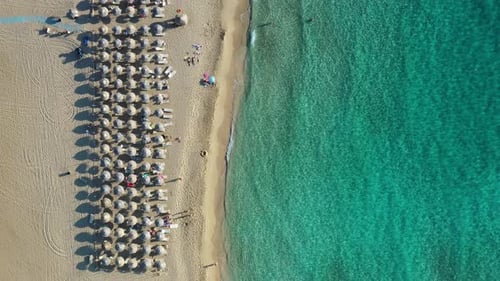 Aerial drone video of Falassarna beach, crystal waters, golden sand, endless sandy turquoise beach o
