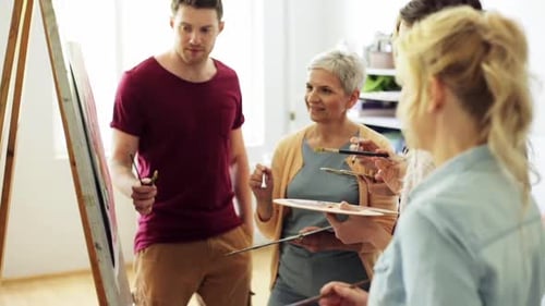 Art Class: Group Painting Together in Studio