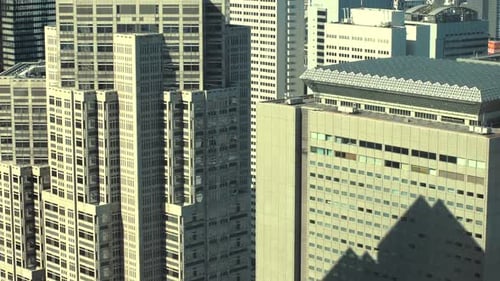 Aerial Footage of the Big Cityscape, with Skyscrapers and Busy Traffic. Daytime in the Megapolis Ci