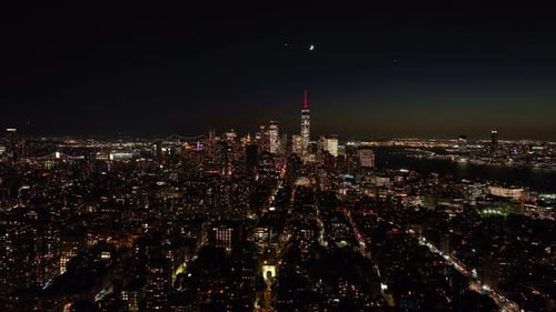 Aerial Views of New York City Skyline at Night Iconic Landmarks of One World Trade Center in the