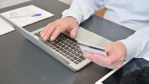 Close Up of Online Shopping by Senior Man
