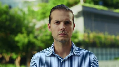 Attractive Young Adult Man Portrait in City