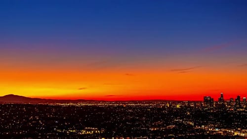 Timelapse, Night and Sunrise Above Los Angeles Cityscape Skyline, Lights and Colorful Sky
