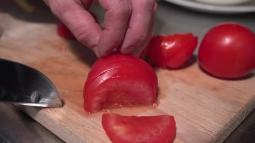 Tomato Slicing on Cutting Board Close-Up