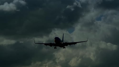 Commercial Airplane Landing at Airport Terminal Runway After Flight