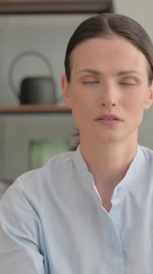 Attractive Brunette Woman Looking at Camera