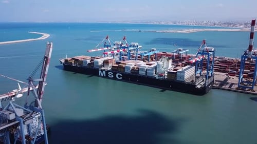 Commercial port with container ships, Aerial footage