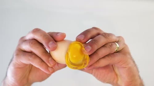Fresh Egg Is Breaking And Spilling To Glass In Slow Motion Cracking An Egg 4k
