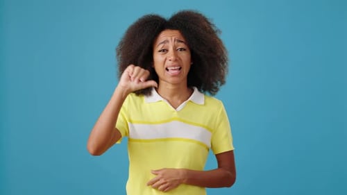 Young AfricanAmerican Shows Dislike and Refuse Gestures