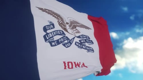 Iowa Flag on a Flagpole Waving in the Wind in the Sky State of Iowa in The United States of America