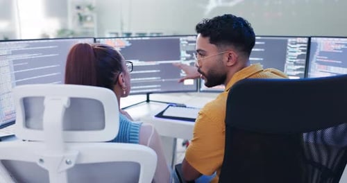 Office, worker and training in computer with coding in teamwork or collaboration as business