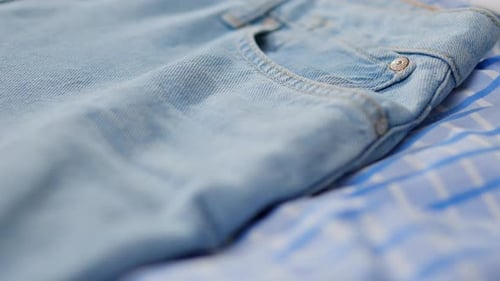 Close Up Of Fabric Textile Of Blue Jeans, Denim Camera In Motion Background For Shop