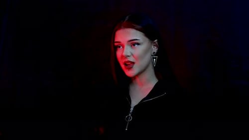 Woman Singing with Red Lighting