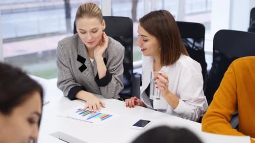 Group of Office Employees Sit and Discuss on Startup Project in Conference Room Team of Business
