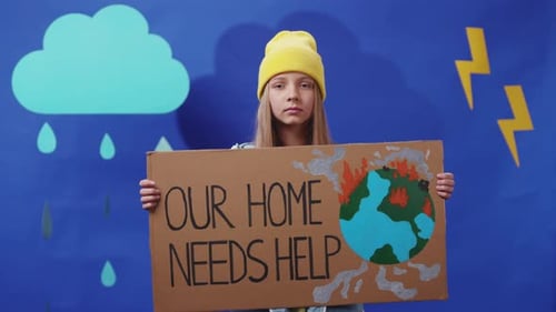 Child Holding Climate Change Sign