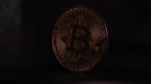 Rotating Bitcoin Cryptocurrency Golden Coin Close Up