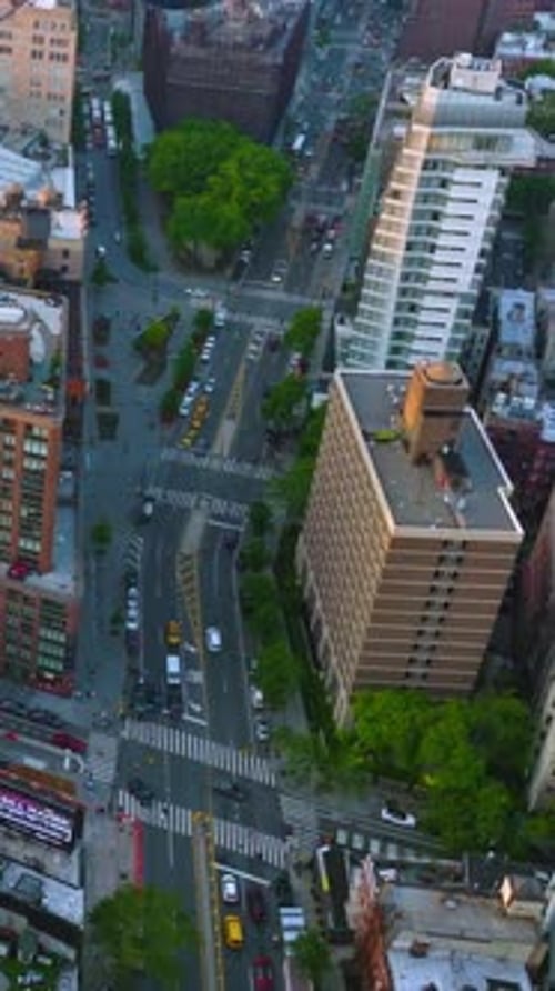 Varied roofs of with metal tanks on in New York.