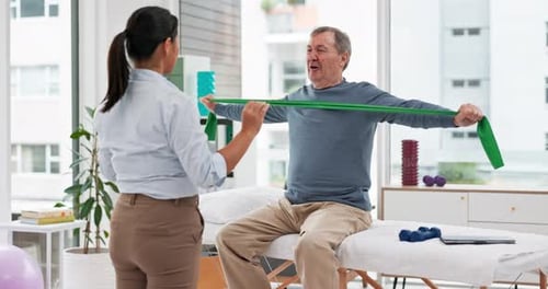 Senior Man Stretching with Physical Therapist