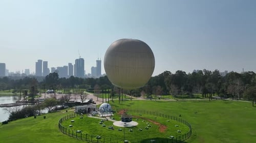 Aerial shot of a hot air balloon over Yarkon Park Tel Aviv, Israel