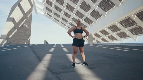 shaved woman making sport outdoor.