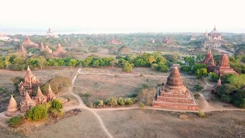 Aerial view of bagan temples at sunrise showing ancient architecture and religious stupas in myanmar