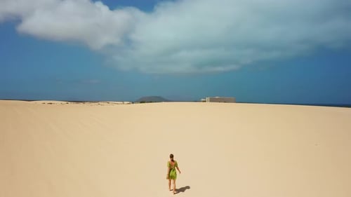 Aerial Flight Over White Sand Dunes in the Desert