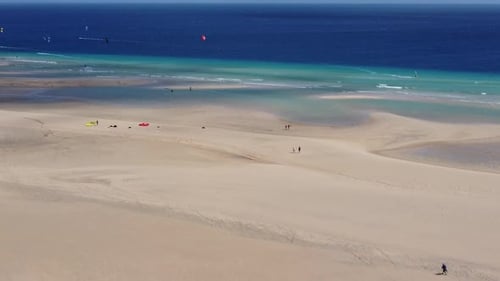 Aerial View of Sandy Beach with Turquoise Water