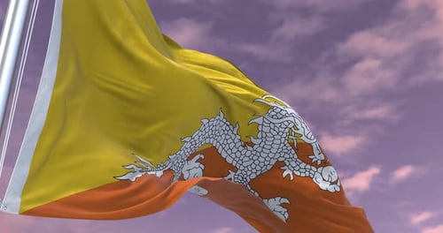 Realistic Bhutan Flag Waving Against a Cloudy Sky