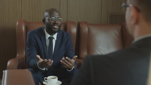 Business Meeting Between Two Colleagues Indoors