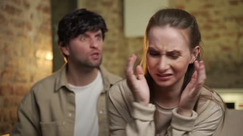 Couple Arguing, Woman Is Upset and Distressed