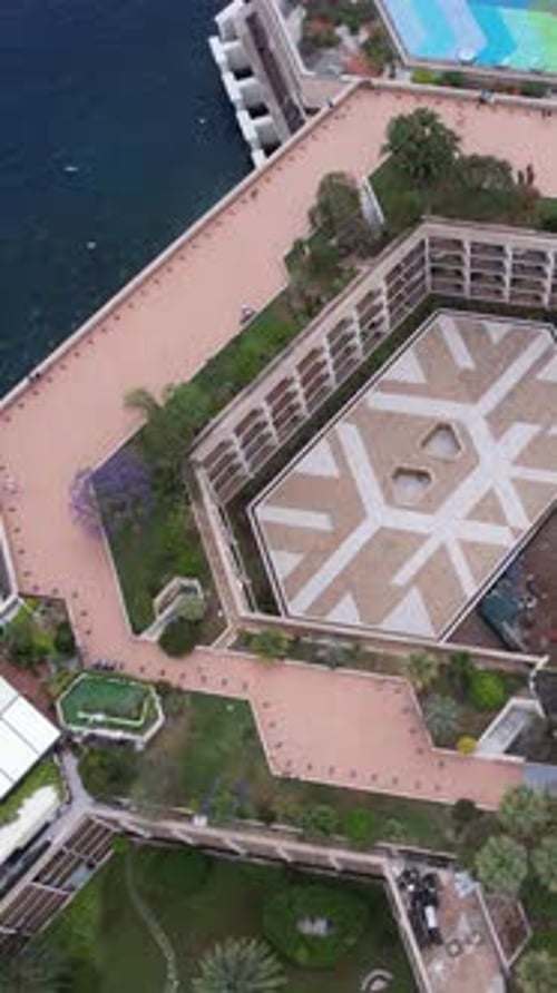 Vertical Drone Shot of Monte Carlo Monaco Waterfront Buildings, Park and Auditorium Hall