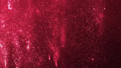 Fundo vermelho de chuva de partículas de celebração