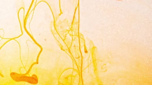 Color Yellow Paint Drops in Water Abstract Color Mix Drop of Ink Color Mix Paint Falling on Water