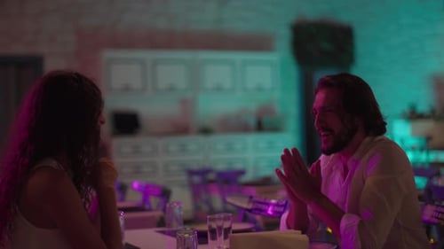 A Couple Talking in the Resturant