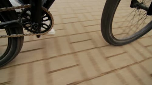 Feet While Riding Bicycle. Cycling Around City. Man Cycling On Road. Healthy Way Of Life. Man Cyc...