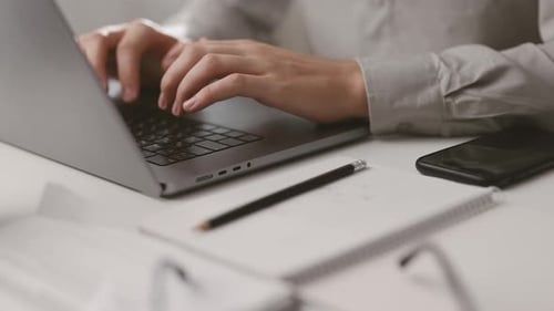 Male Typing on Laptop Closeup